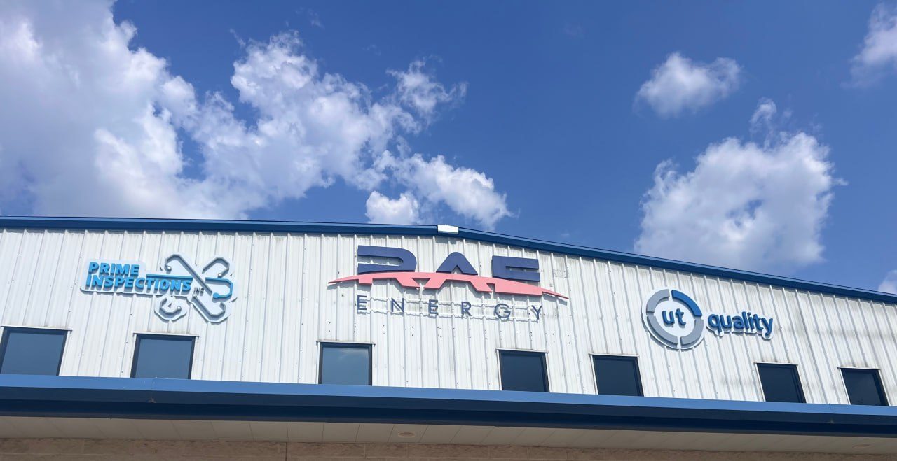 RAE Energy headquarters in Katy, Texas with RAE Energy, Prime Inspections and UT Quality signage