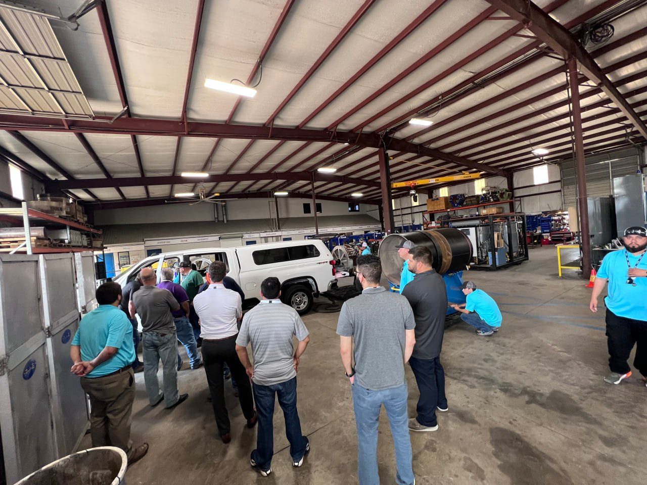 RAE Energy team gathered on the shop floor at the Katy, Texas facility